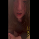 Emi sits on the toilet in a black top, pushes out pungent turds and holds them up to her face for the camera, then plunges the clogged toilet. Vertical format video. Over 15 minutes.